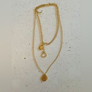 Yellow gold hammered circle three layered necklace.